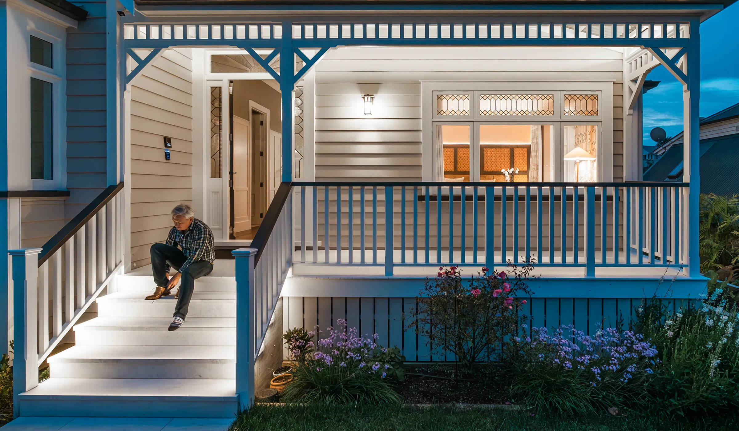 St Marys Bay villa front steps lit at dusk