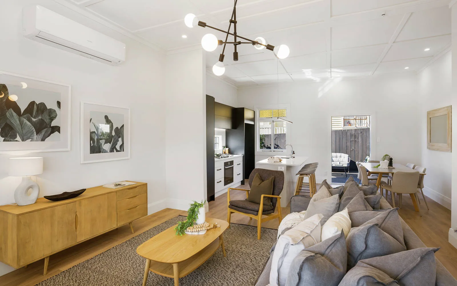 Living room with a high wall heat pump