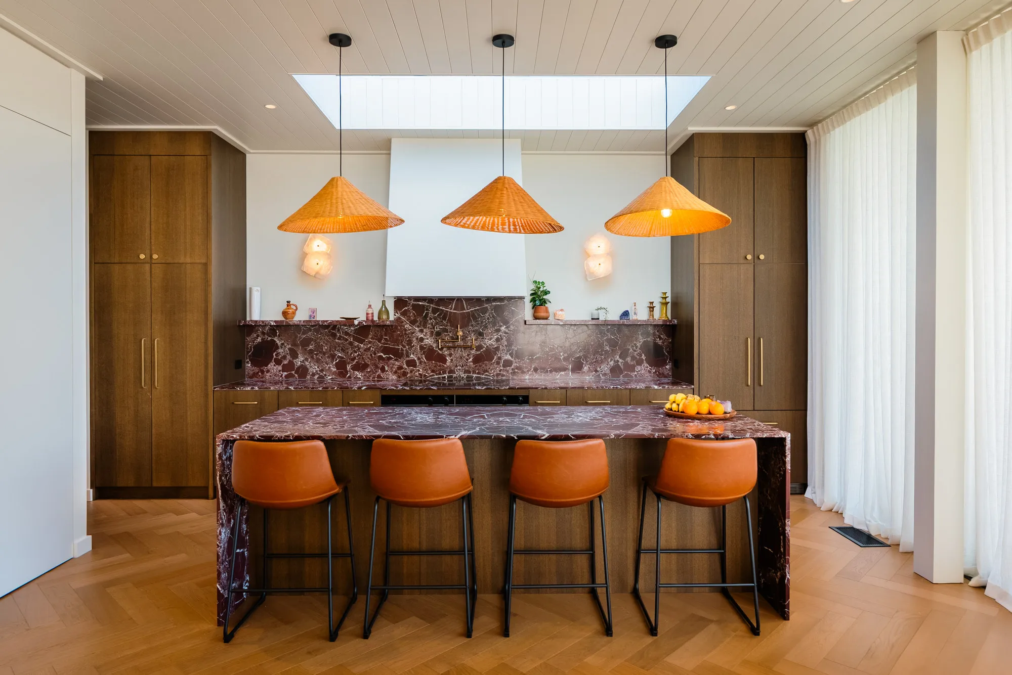 Devonport villa kitchen with orange pendant lights