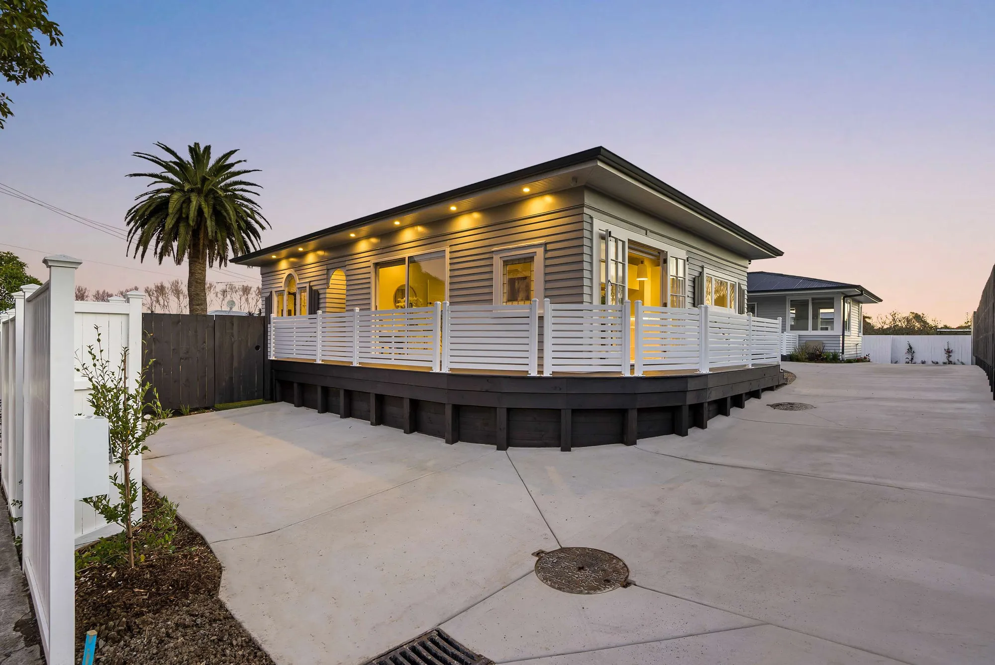 Relocated home in Glen Innes lit at dusk